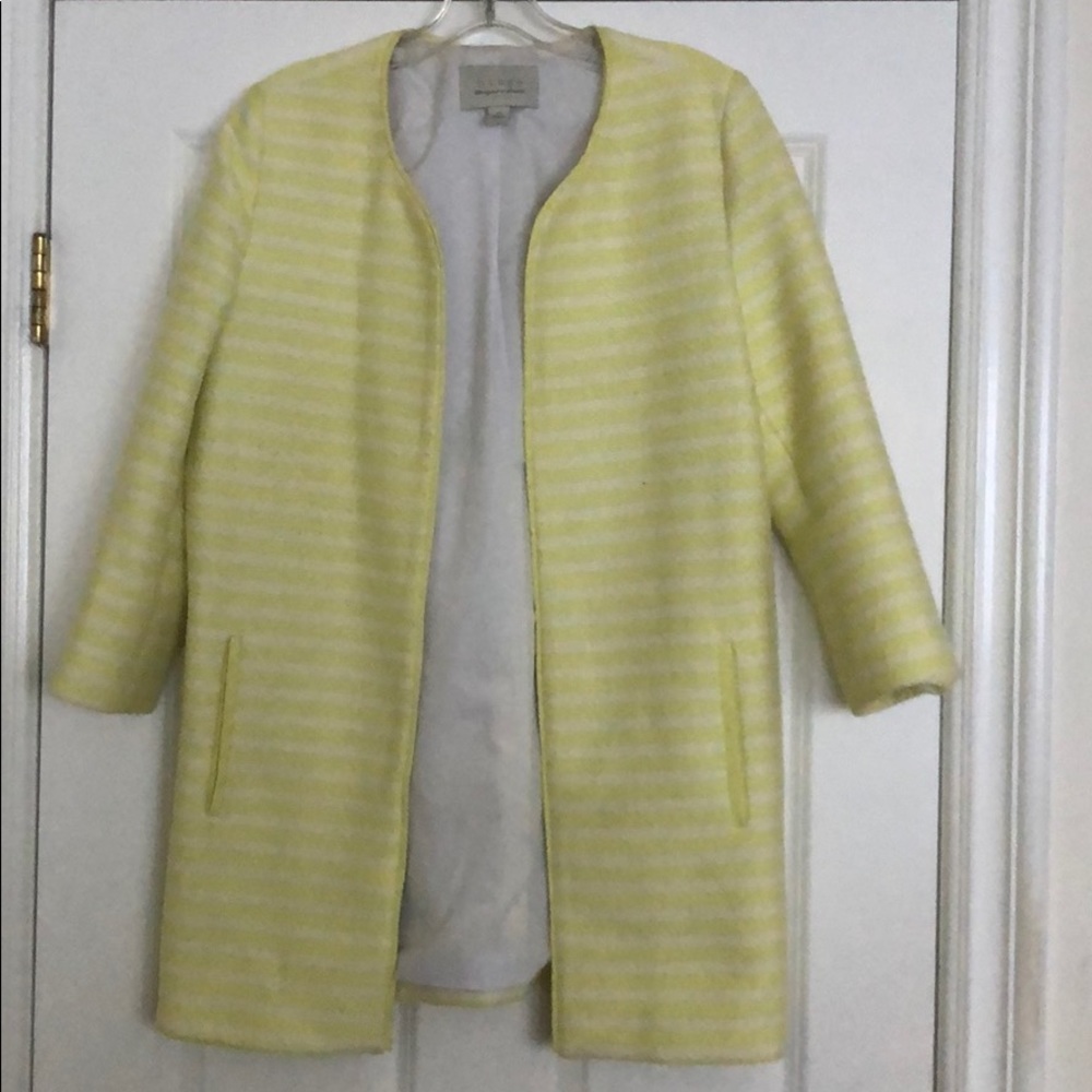 Mid-length, white and yellow, striped jacket